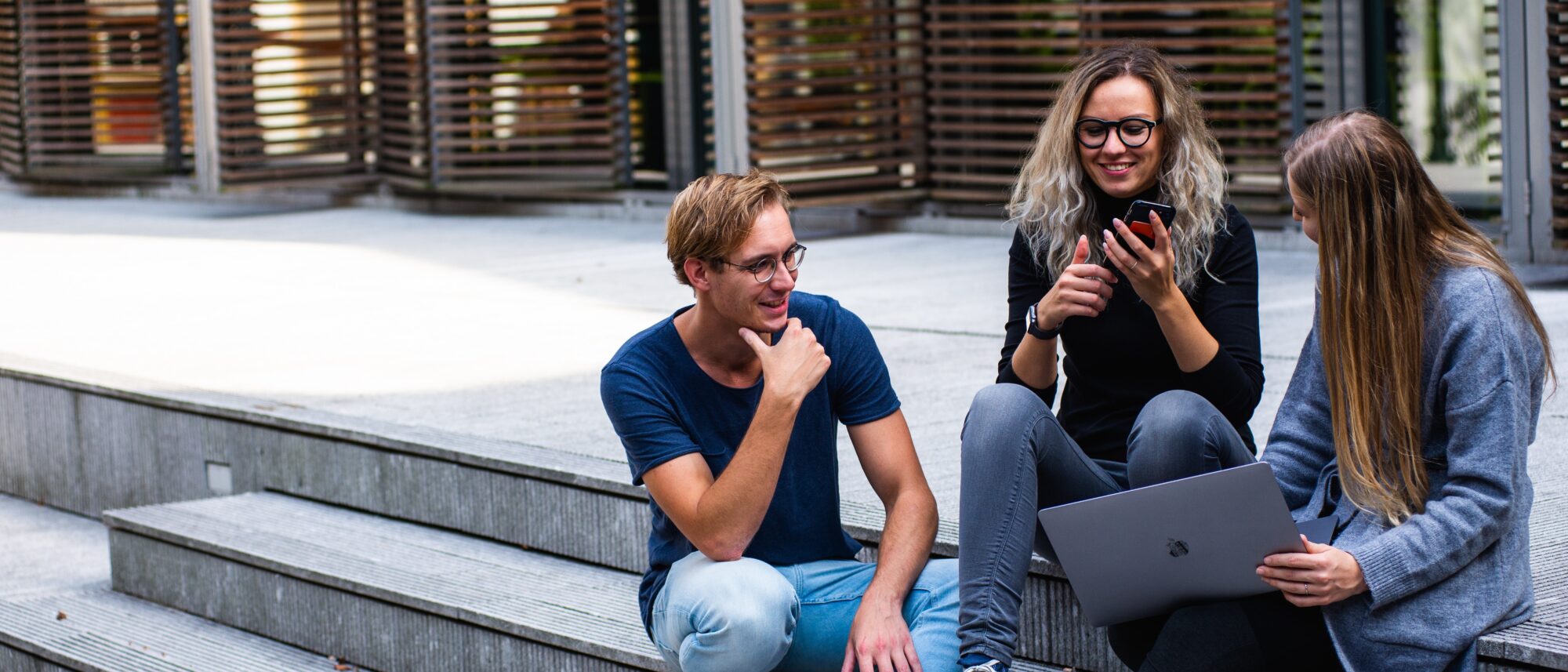 Students sat on steps